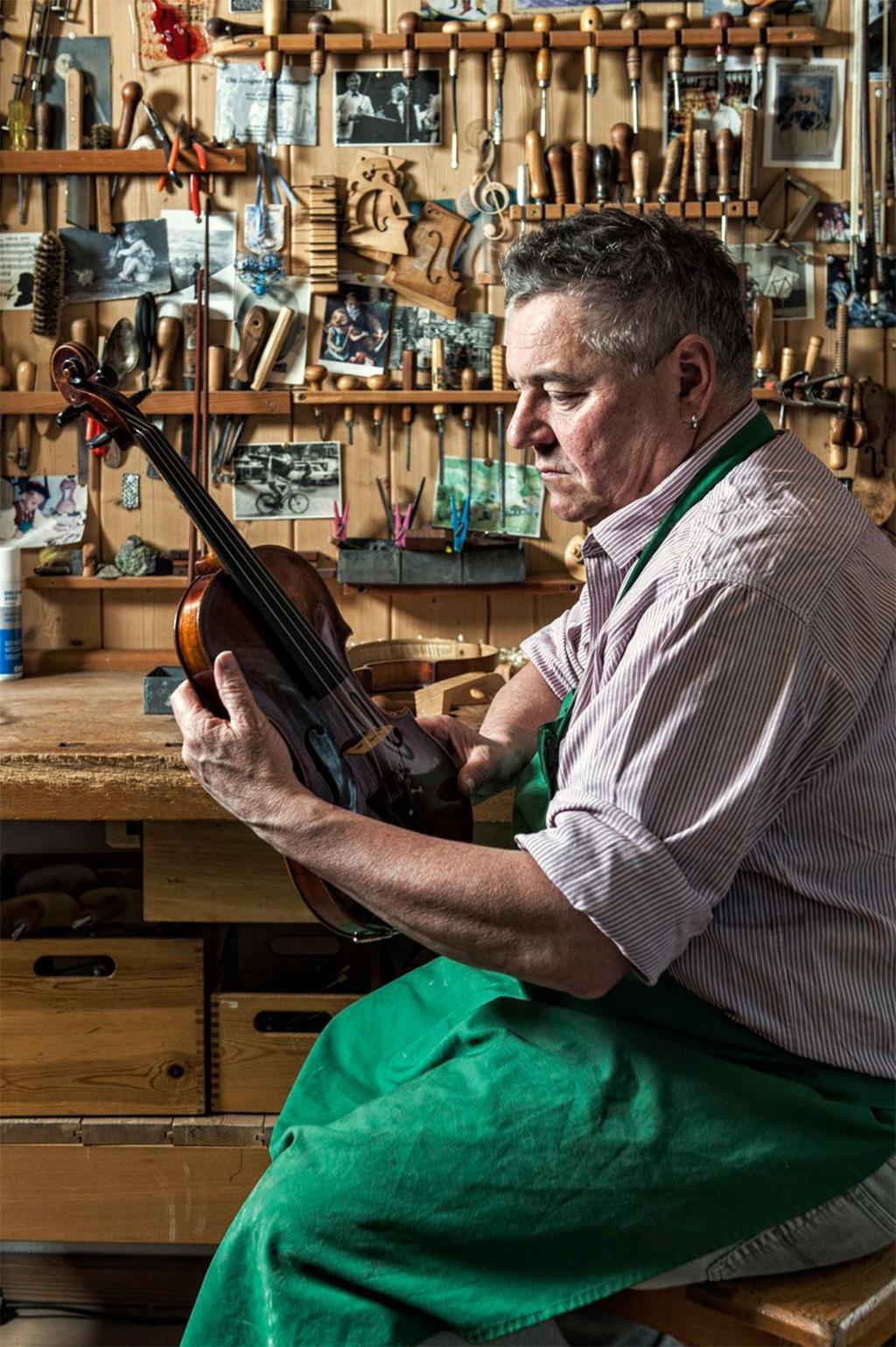 Rainer Leonhardt handcrafts violins in his workshop in Mittenwald, Bavaria
